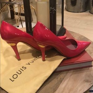 Louis Vuitton pink patent leather pumps.